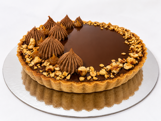 Chocolate caramel and hazelnut tart